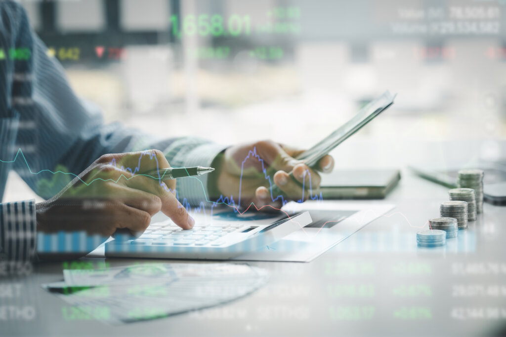 Stock price charts and stock market analysis, stock trading technology and digital assets, investors analyzing stock charts for profitable trading. Money growth. The idea of investing money to grow.